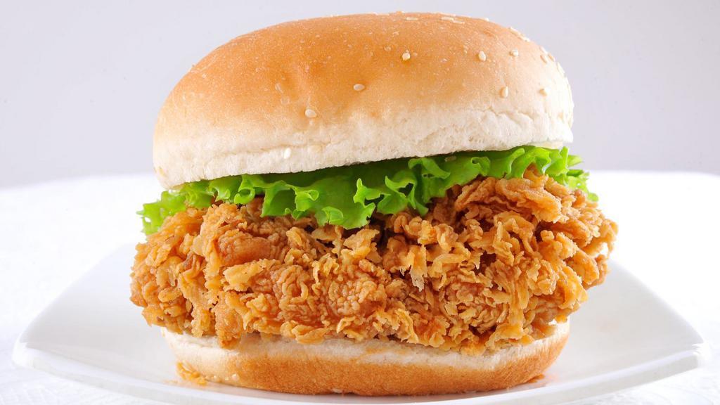 Crunchy Chicken Sandwich · Juicy chicken sandwich made on french bread with breaded chicken breast, mayo, fresh lettuce, and tomatoes.