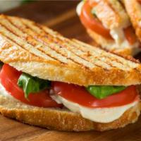 Portobello Veggie Sandwich · Hearty veggie sandwich made on french bread with portobello mushrooms, sliced sweet potato, ...