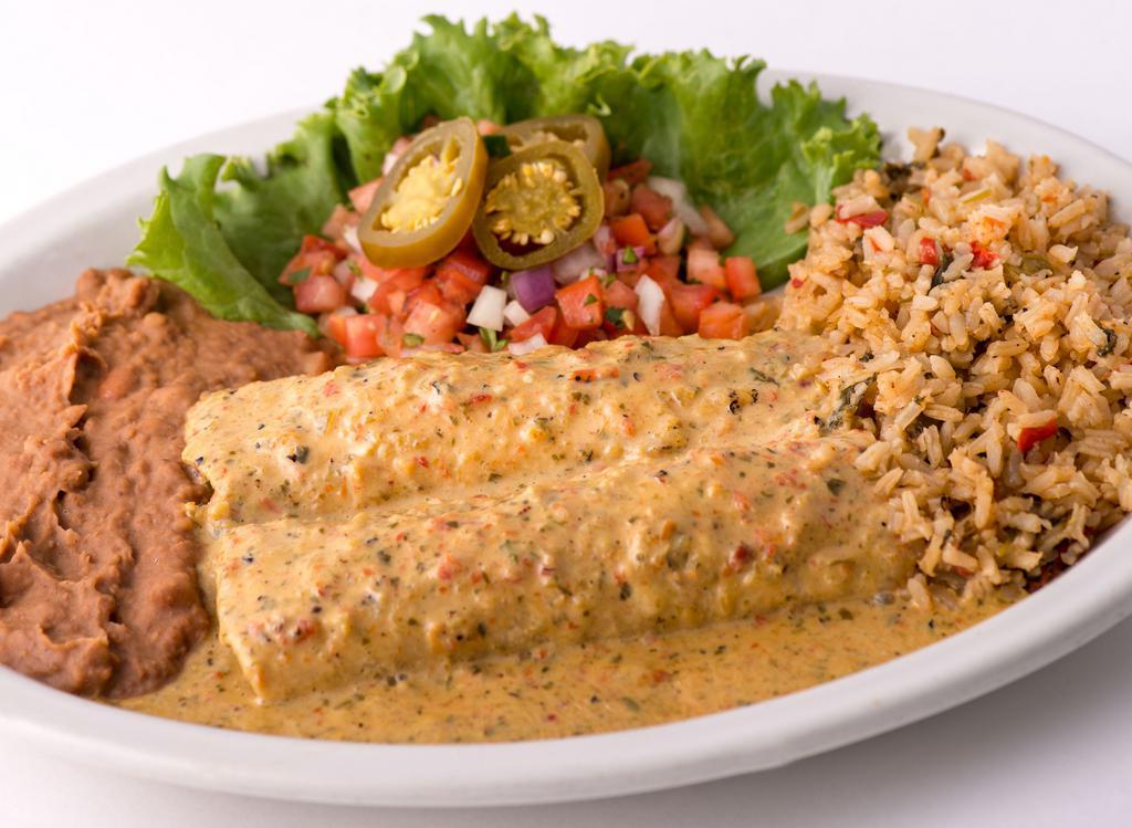 Chicka-Chicka Boom-Boom Enchiladas · Roasted chicken and cheese with our fan favorite Boom-Boom (hot) Sauce. Served with Mexican rice and refried beans.