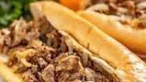 Regular Philly Cheesesteak · Served on a fresh 8' hoagie roll and grilled SIRLOIN  steak, onions, melted white American c...