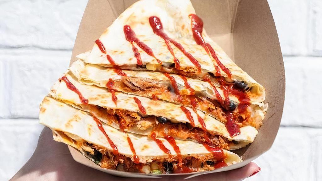 Quesadilla · Your Choice Of Protein Stuffed Inside A 12
