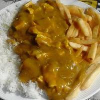 Curry Chicken · An Indian style curry made with chicken, in an onion and tomato-based
sauce, flavored with g...