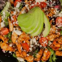 Mexican Salad · Mixed greens, black beans, charred sweet corn, cherry tomatoes, avocado and Mexican encurtid...