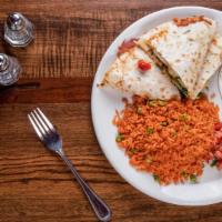 Quesadilla · Panela cheese, retried black beans, onions, peppers and rice.