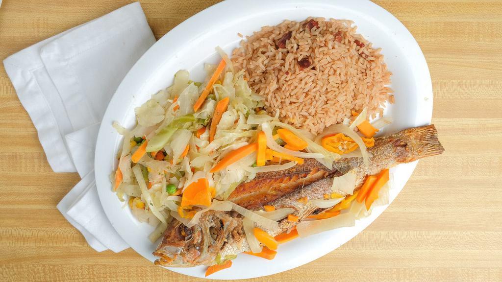 Ackee And Saltfish · Jamaica’s National fruit is ackee. Ackee and Saltfish is Jamaica’s National dish prepared with salted codfish, ackee, onions, tomatoes and scotch bonnet peppers creating a taste bud sensation.