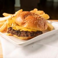 Tdc Burger · Eight ounces.  Black Angus beef topped with American cheese stacked high on a toasted bun wi...