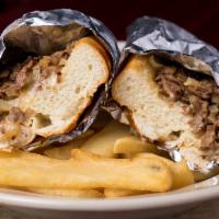 Steak & Cheese · Thirty years of goodness. Our classic grilled, thinly sliced ribeye cooked with onions. Serv...