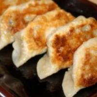 Gyoza (6 Pcs) · Choice of vegetable or pork dumplings, steamed on pan fried.