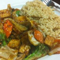 Szechuan Tofu · Served with white rice.