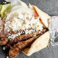 Gyro · Includes lettuce, tomato, onions, feta cheese, tzatziki sauce, and your choice of meat (Lamb...