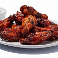 Daytona Wings · Naked wings tossed in Daytona sauce and grilled until caramelized. 820 cal | ranch or bleu c...