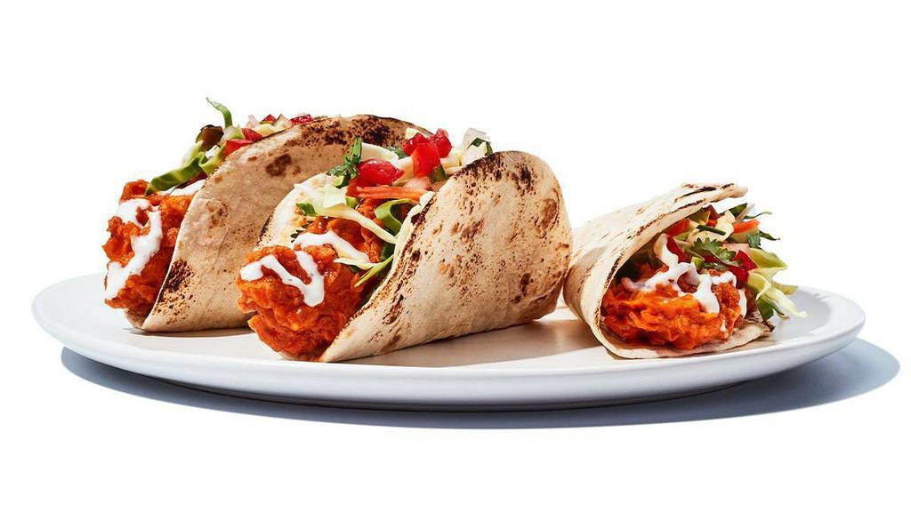 Buffalo Chicken Tacos · Grilled or crispy chicken tossed in your favorite wing sauce, topped with cabbage, diced tomatoes and your choice or ranch of bleu cheese inside flour tortillas. Grilled 700-1000 cal | Fried 950-1250 cal| lite ranch or bleu cheese 310/380 cal