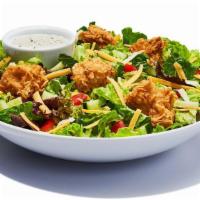 Chicken Garden Salad · Mixed lettuce piled with tomatoes, crisp cucumbers, cheddar cheese, croutons and your choice...