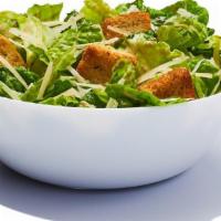Caesar Salad · Romaine mixed with parmesan and croutons tossed with a creamy garlic dressing. 610 cal