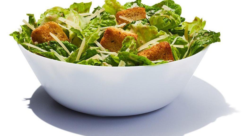 Side Caesar Salad · Romaine lettuce with shredded parmesan cheese, home style croutons and creamy Caesar dressing. 240 cal