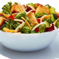 Side Garden Salad · Mix of romaine and iceberg lettuce with tomato, cucumber, cheddar and monterey cheese, crout...