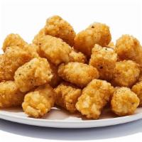 Tots · Some people say the perfect food, bite size, crispy, crunchy and delicious tossed with our o...