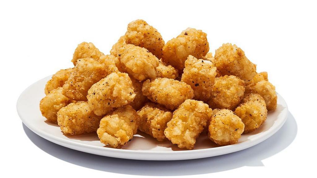 Tots · Some people say the perfect food, bite size, crispy, crunchy and delicious tossed with our own seasoning. 570 cal