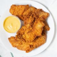 Chicken Fingers With French Fries · Golden brown fried chicken breast tenders served with shoestring French fries.