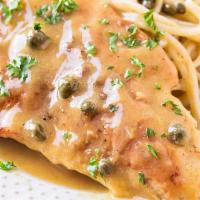 Chicken Piccata · Chicken breast sautéed with capers in white wine sauce with a touch of marinara on a bed of ...