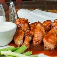 Sal'S Famous Wings · Served with celery sticks, choice of ranch or blue cheese dressing.