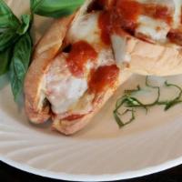 Chicken Parmigiana Sub · Lightly breaded chicken baked with tomato sauce, topped with mozzarella cheese.