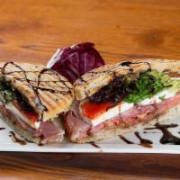 Sal’S Favorite Panini · Prosciutto, capicola ham, fresh mozzarella,
tomatoes, mixed greens, roasted bell peppers,
dr...