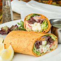 Chicken Bacon Ranch  Wrap · Crispy chicken with mixed greens, tomatoes, onion, bacon and ranch dressing.