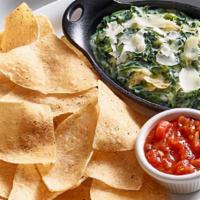 Spinach & Artichoke Dip · Creamy blend of spinach, parmesan cheese and artichoke hearts served with tortilla chips and...