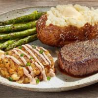 Steak & Crab Cake (Crab, That Is)* · A 6-oz. USDA Choice sirloin steak paired with a pan-seared lump crabmeat cake drizzled with ...