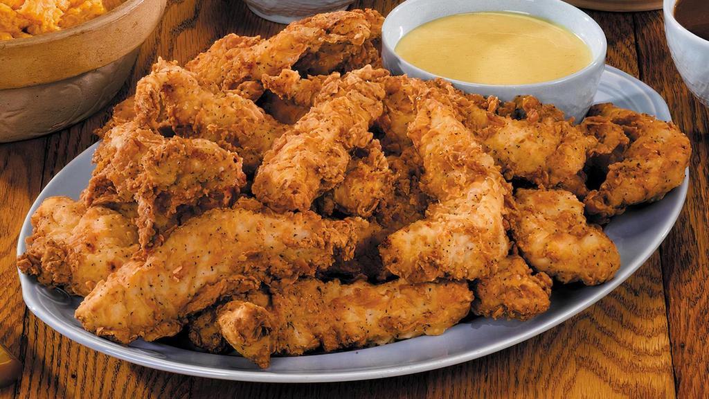 Famous Chicken Tenders Family-Style Meal · Serves 6. Chicken tenders dipped in buttermilk and lightly fried, with Honey Mustard dressing for dipping. Served with rolls and your choice of two family-size sides.