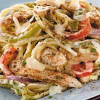 New Orleans Cajun Chicken Pasta Family-Style Meal · Serves 4-6. Cajun-seasoned chicken with sauteed peppers, onions and parmesan cheese tossed w...