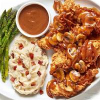 Country Style Tenders · O’Charley’s Famous Chicken Tenders smothered with hearty country gravy, mushrooms and onions...