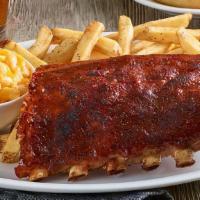 Baby Back Ribs · Hand-rubbed with seasonings. Also available Nashville Hot or Carolina Gold BBQ Sauce. Served...
