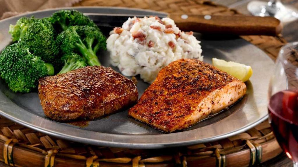 Steak & Grilled Atlantic Salmon* · Salmon fillet with a 6-oz. sirloin.