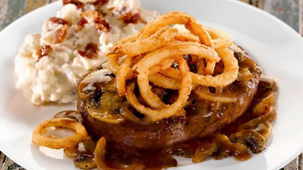 Chopped Steak* · Covered with mushrooms, onions and gravy then topped with fried onions. Served with bacon smashed potatoes.