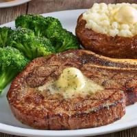 Bone-In Ribeye* · Our USDA Choice 14-oz. bone-in ribeye, well-marbled and full of flavor. Served with two sides.
