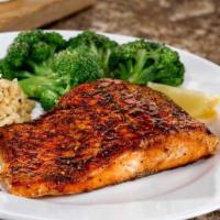 Grilled Atlantic Salmon* · Hand-cut, herb-seasoned and served with two sides. Also available Blackened, Bourbon-Glazed ...