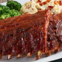 Baby Back Ribs ~ Half Or Full · Our ribs are huge (Full-Rack is pictured)! Rubbed with a blend of brown sugar, paprika, garl...