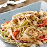 New Orleans Cajun Chicken Pasta · Grilled and sliced seasoned chicken with sauteed peppers, onions and parmesan cheese tossed ...