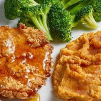 Honey-Drizzled Southern Fried Chicken · A buttermilk breaded chicken breast drizzled with honey. Served with mashed sweet potatoes a...