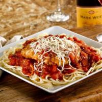 Chicken Parmesan · One of our Seasonal Favorites! Hand-breaded chicken breast topped with red pepper marinara a...