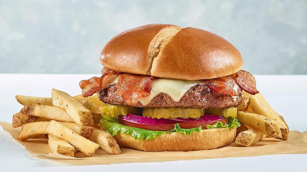 Bacon Cheddar Burger* · Applewood-smoked bacon, cheddar cheese, lettuce, tomato, pickles and onion. Served with fries.