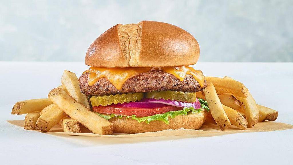 Classic Cheeseburger* · Cheddar cheese, lettuce, tomato, onion and pickles. Served with fries.