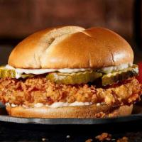 New! Chicken Sandwich · Fried chicken breast, pickles and mayo on a toasted bun.. Served with fries. MAKE IT BUFFALO...