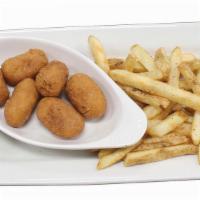 Kids Mini Corn Dogs · Six mini corn dogs served with choice of honey mustard or ranch for dipping and a kids side ...