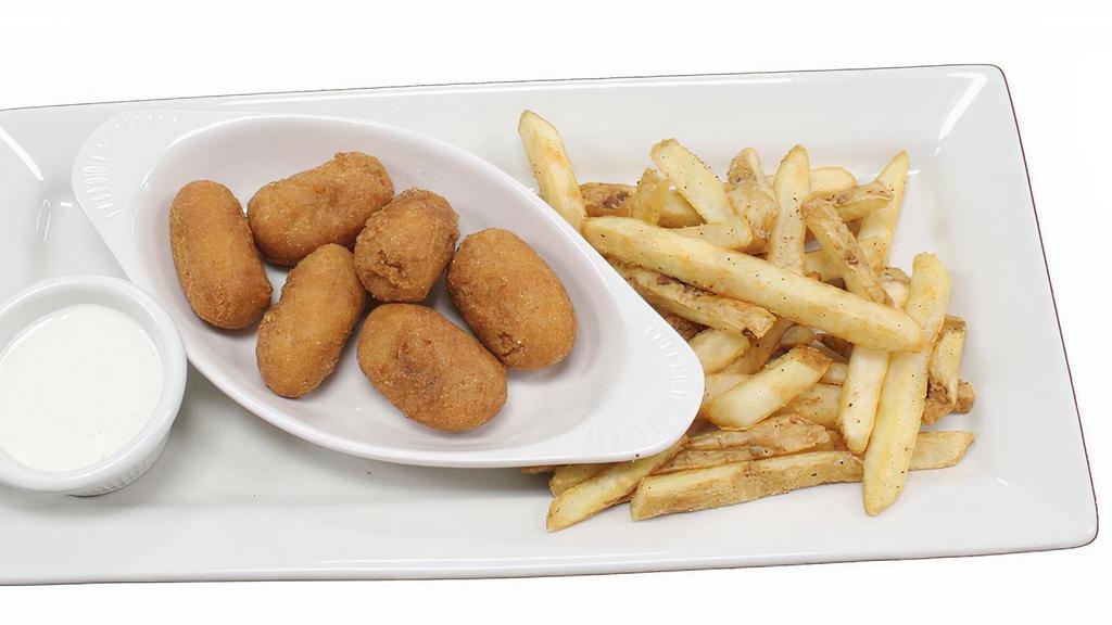 Kids Mini Corn Dogs · Six mini corn dogs served with choice of honey mustard or ranch for dipping and a kids side item.