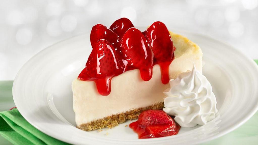 Strawberry Cheesecake · One of our Seasonal Favorites! Creamy cheesecake topped with fresh strawberries in a sauce, served with whipped cream.
