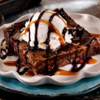 Brownie Lover'S Sundae For Two · Our decadent walnut brownie filled with toffee morsels, drizzled with chocolate and caramel ...