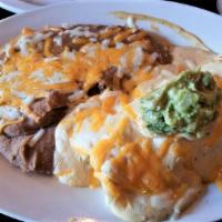 Sonora Burrito · Generous chunks of grilled chicken breast rolled in a large flour tortilla, oven baked with ...